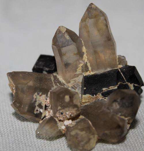 6 light smokey quarts crystals with black tourmaline